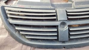 Dodge Grand Caravan Front bumper upper radiator grill 04857218AD