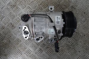 Hyundai Tucson IV NX4 Ilmastointilaitteen kompressorin pumppu (A/C) 97701-N7250