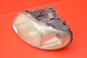 Chrysler Grand Voyager IV Lampa przednia 04857703AB