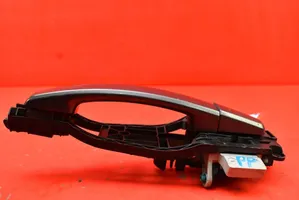 Opel Zafira B Klamka zewnętrzna drzwi przednich 24463524