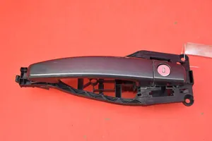 Opel Zafira B Front door exterior handle 24463523