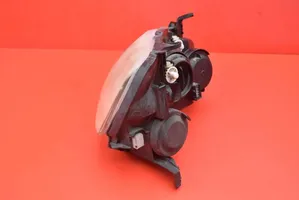 Opel Corsa C Lampa przednia 13115006