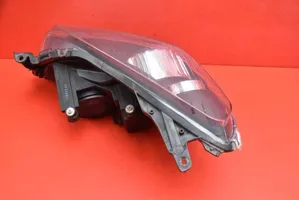 Opel Astra H Lampa przednia 0000