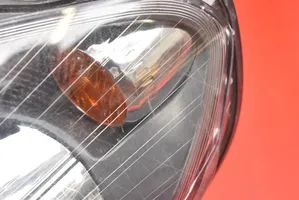 Opel Zafira B Lampa przednia 0000