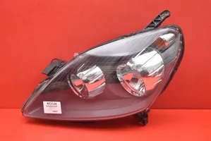 Opel Zafira B Lampa przednia 0000