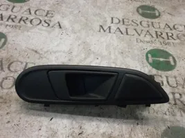 Ford Fiesta Klamka wewnętrzna drzwi przednich 