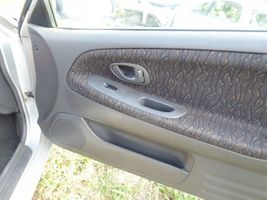 Mitsubishi Colt Front door card panel trim 