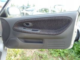 Mitsubishi Colt Front door card panel trim 