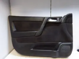 Opel Astra G Revestimiento de puerta delantera 024404573