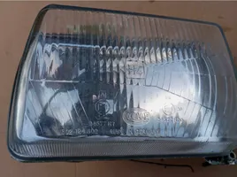 Volkswagen PASSAT B2 Lampa przednia 302124502