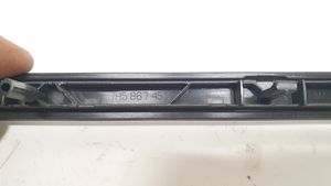 Volkswagen Multivan T5 Moldura del tarjetero del panel de la puerta trasera 7H5867450