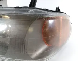 Mitsubishi Pajero Sport I Lampa przednia 