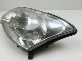 Toyota Corolla E120 E130 Lampa przednia 89010230