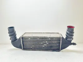 Ford Focus Starpdzesētāja radiators XS4Q9L440BD