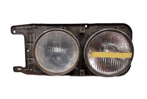 BMW 3 E30 Lampa przednia 310110480