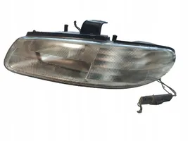 Chrysler Town & Country III Lampa przednia 04897389AC