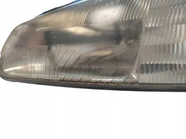 Chrysler Town & Country III Lampa przednia 04897389AC