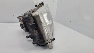 Volvo 740 Lampa przednia 1305239009