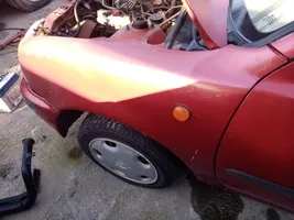 Nissan Micra C+C Błotnik przedni 6310150B30