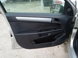 Opel Astra G Revestimiento de puerta delantera 13153881