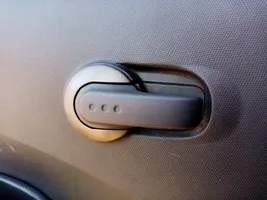 Nissan Micra C+C Klamka wewnętrzna drzwi tylnych 80671AX603