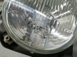 Volkswagen Golf II Lampa przednia 7R0114551