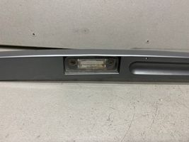 Ford Fiesta Listwa oświetlenie tylnej tablicy rejestracyjnej 2S61A43404