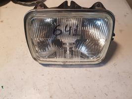 Mazda 323 Lampa przednia 104R7