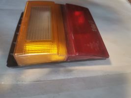 Audi 200 Lampy tylnej klapy bagażnika 443945225