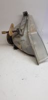 Ford Escort Lampa przednia 002124099