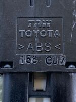 Toyota Avensis T250 Interruttore di regolazione livello altezza dei fari J56C07