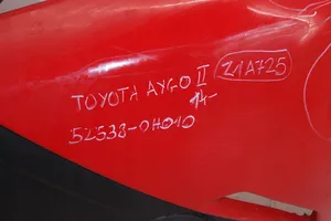 Toyota Aygo AB40 Zderzak przedni 521190H140