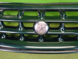 Plymouth Voyager Front bumper upper radiator grill 04676516