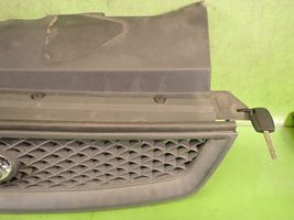 Ford Focus Maskownica / Grill / Atrapa górna chłodnicy 4M51-8200BK