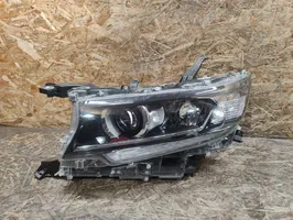 Toyota Land Cruiser (J150) Lampa przednia 8990760030