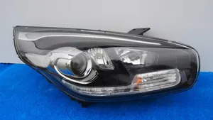 KIA Carens III Lampa przednia 92102-A4