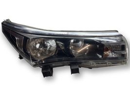 Toyota Corolla E160 E170 Lampa przednia 8111002E71