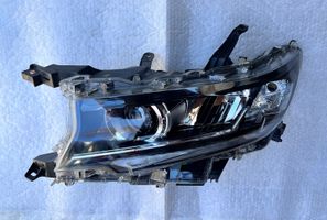 Toyota Land Cruiser (J150) Lampa przednia 8118560N20