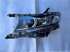 Toyota Land Cruiser (J150) Lampa przednia 8118560N20