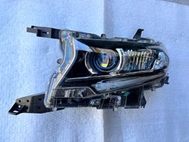 Toyota Land Cruiser (J150) Lampa przednia 8118560N20