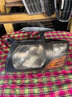 Mitsubishi Pajero Sport I Lampa przednia 9928699005