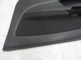 Opel Corsa D Rivestimento del pannello della portiera anteriore 13232891