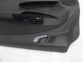 Opel Corsa D Revestimiento de puerta delantera 13232891