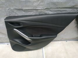 Mazda 6 Moldura del tarjetero de la puerta trasera 
