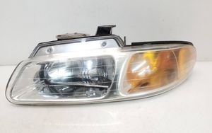 Chrysler Town & Country III Lampa przednia 4600159445