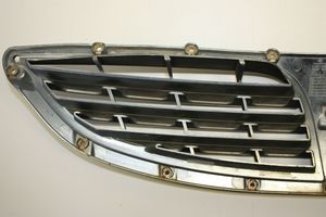 SsangYong Kyron Grille calandre supérieure de pare-chocs avant 7945109000