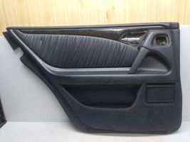 Mercedes-Benz E W210 Garniture panneau de porte arrière A2107306170