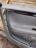 Volvo V70 Rivestimento del pannello della portiera anteriore 39964994