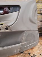 Volvo V70 Rivestimento del pannello della portiera anteriore 39964994