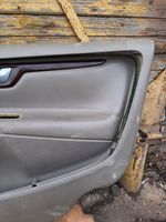 Volvo V70 Rivestimento del pannello della portiera anteriore 39965084